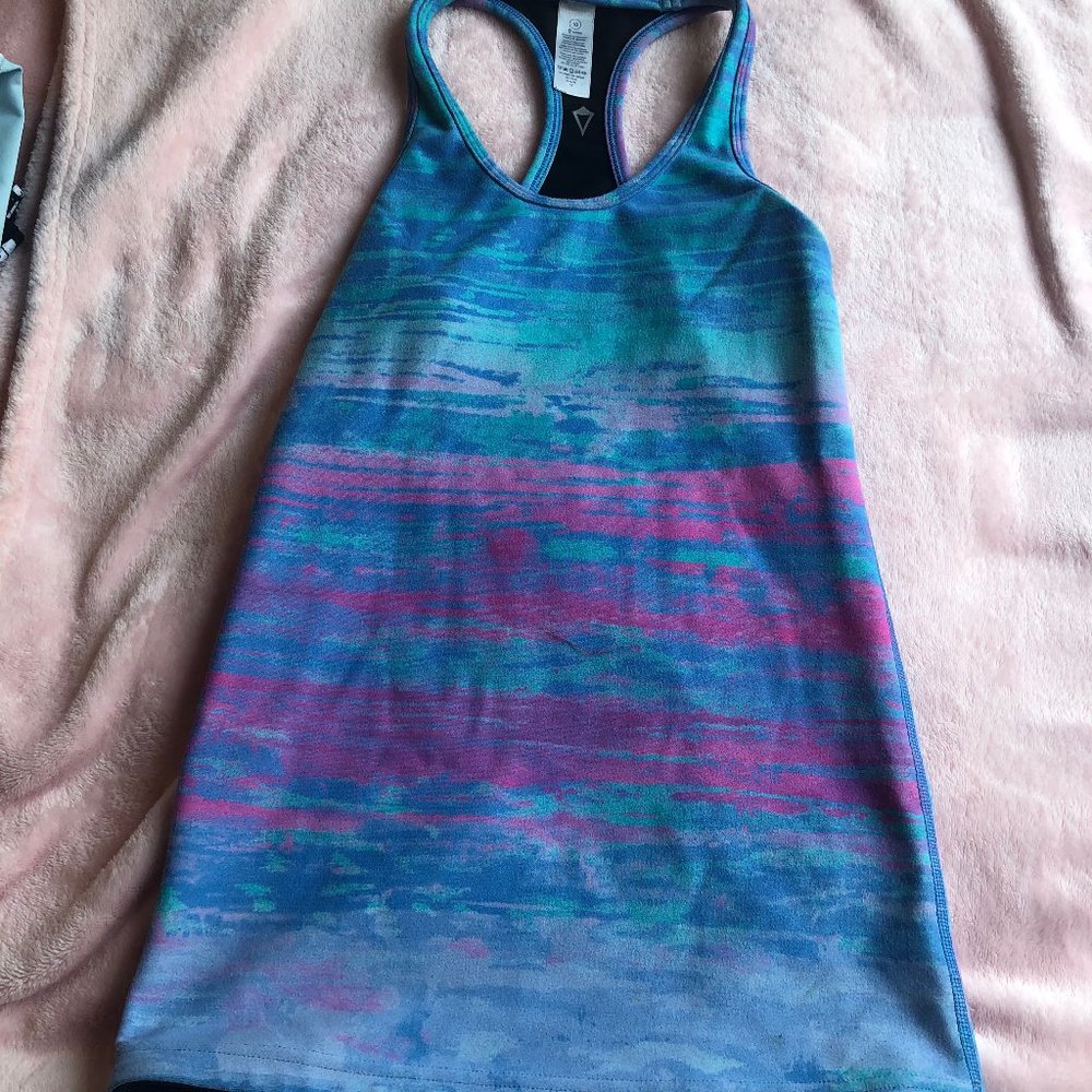 Reversible ivivva tank